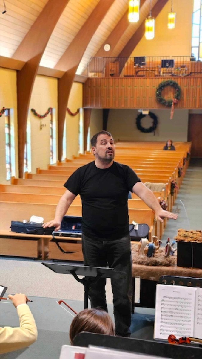 Dr. Anton Yertesky conducting Nova Youth Chamber Orchestra at a Christmas concert